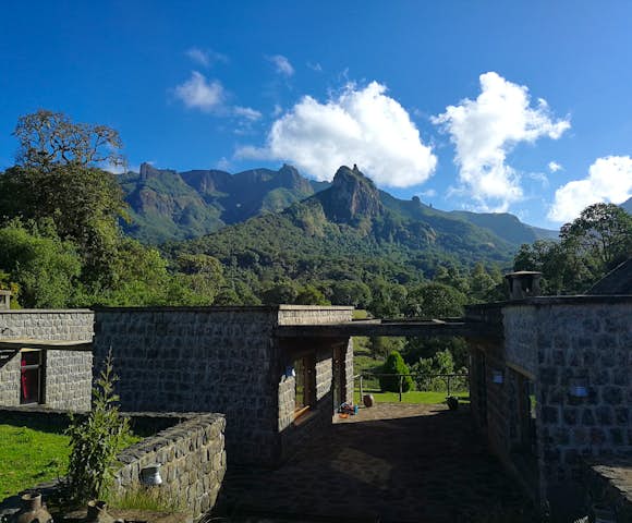 Bale Mountains Lodge entrance and view of mountain