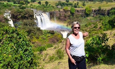 Woman in front of Blue Nile Falls in Bahir Dar